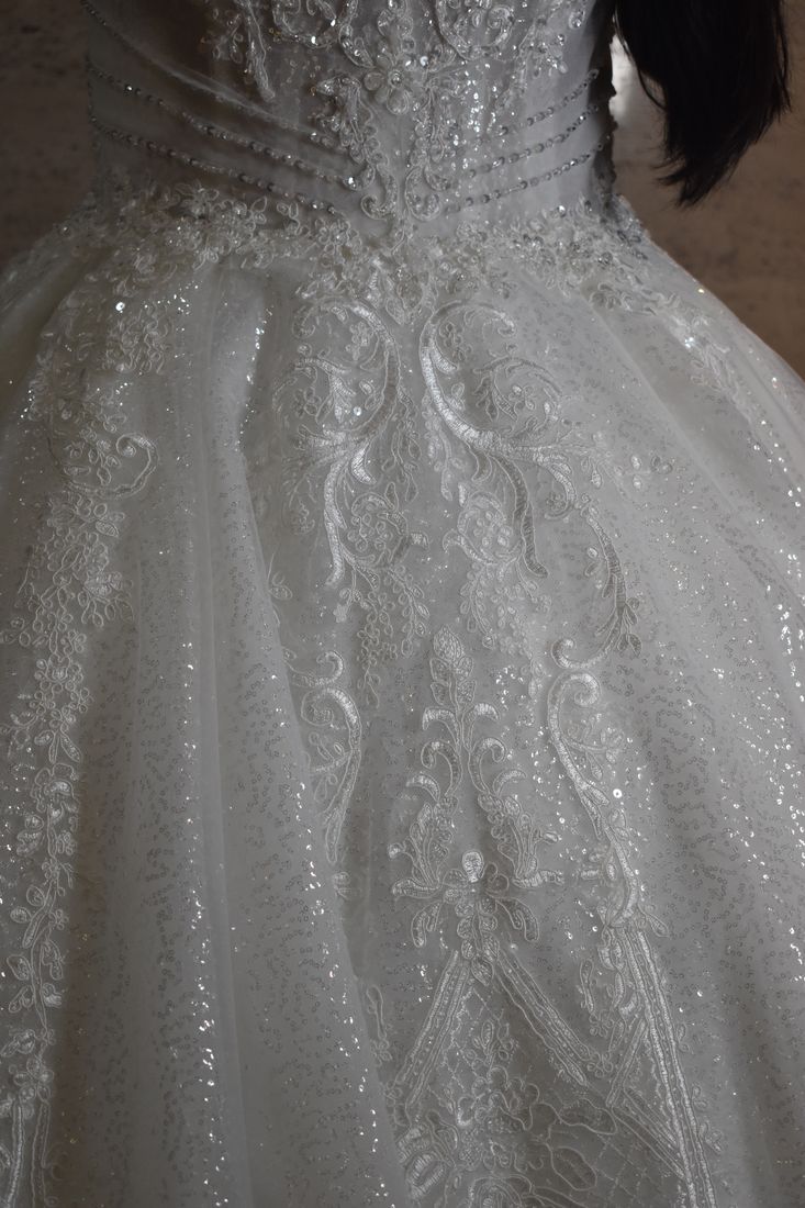 Fine white lace and beadwork used on communion dresses